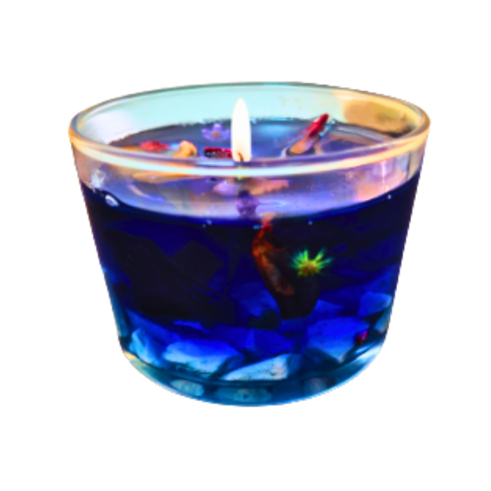 נר סויה ריחני בכוס שקופה, עם קישוטים צבעוניים ושמן אתרי, לשיפור אווירה בבית.